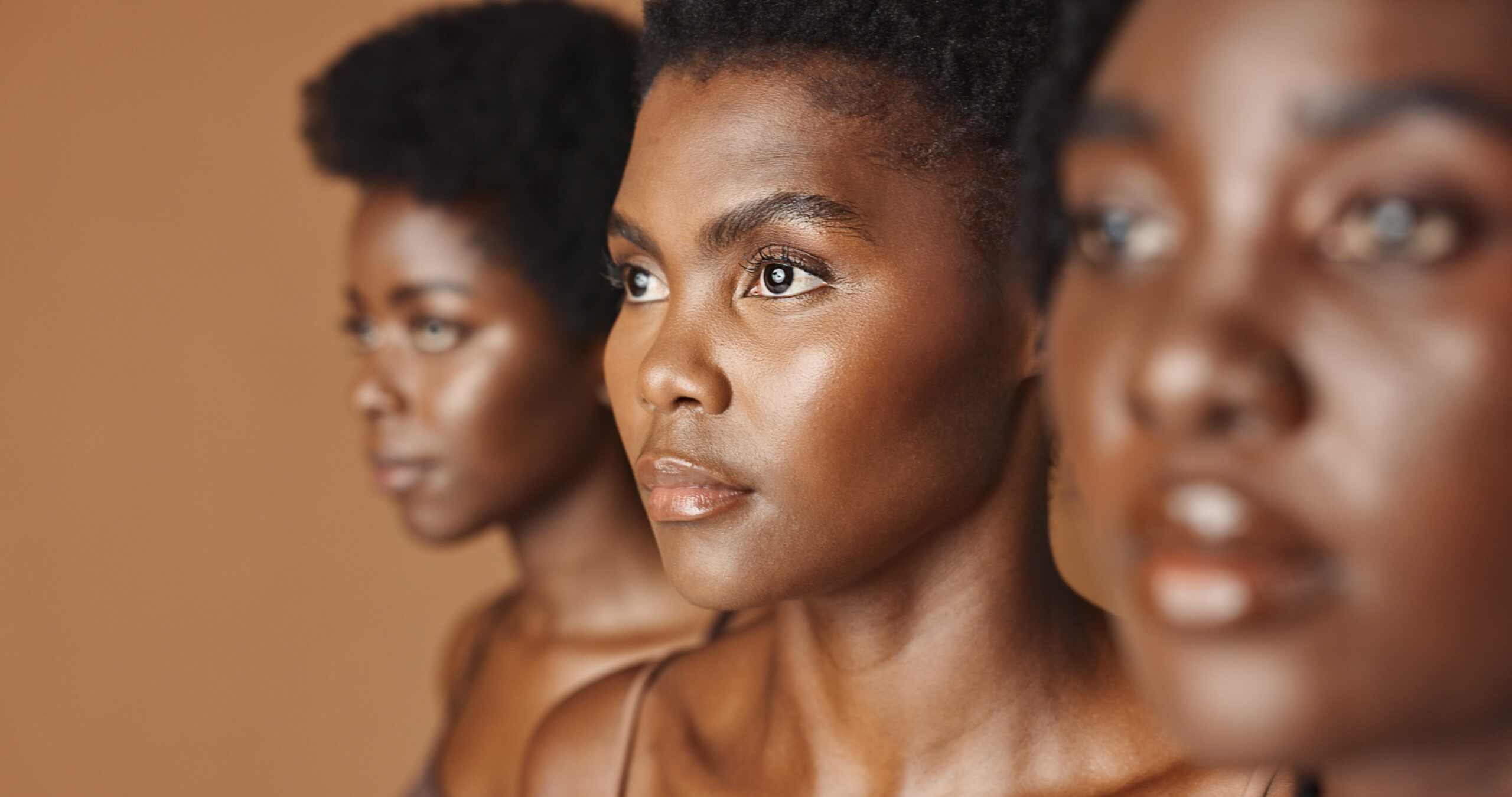 Skincare, beauty or black women models with glowing skin or afro isolated on brown background. Faci.
